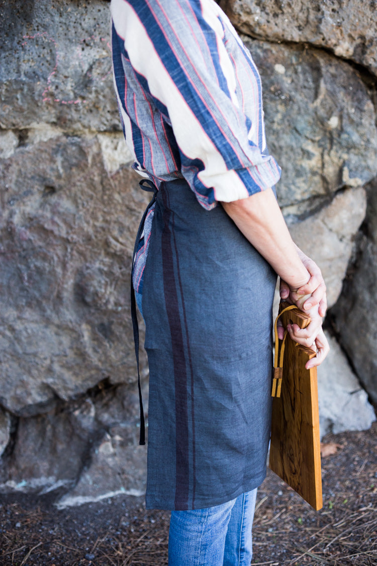Charcoal colored 100% linen towel doubles as an apron #linenapron #apron