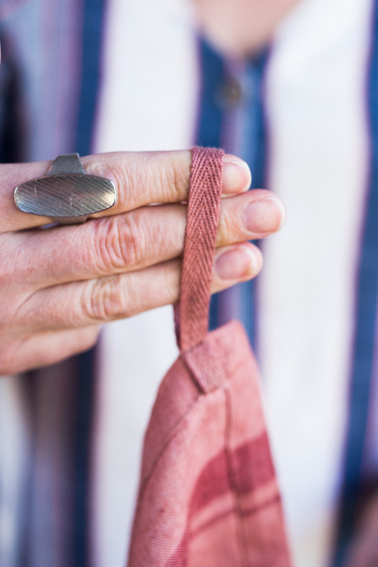 Salmon colored 100% linen towel doubles as an apron #linenapron #apron