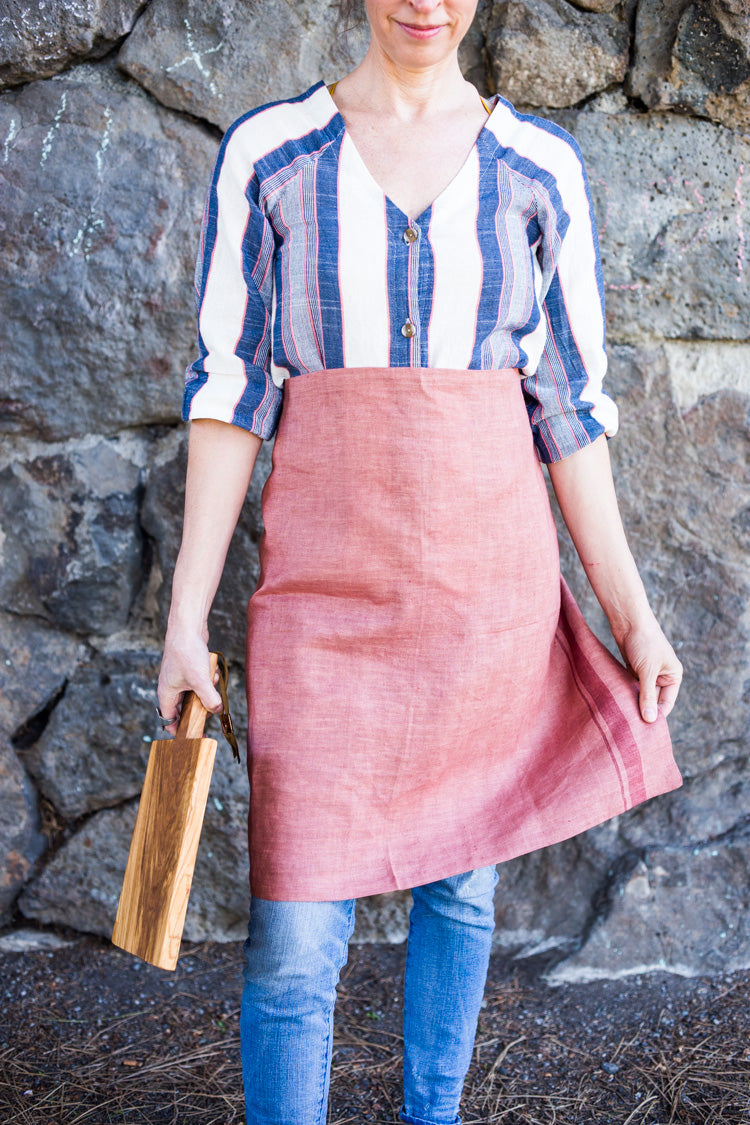 Salmon colored 100% linen towel doubles as an apron #linenapron #apron
