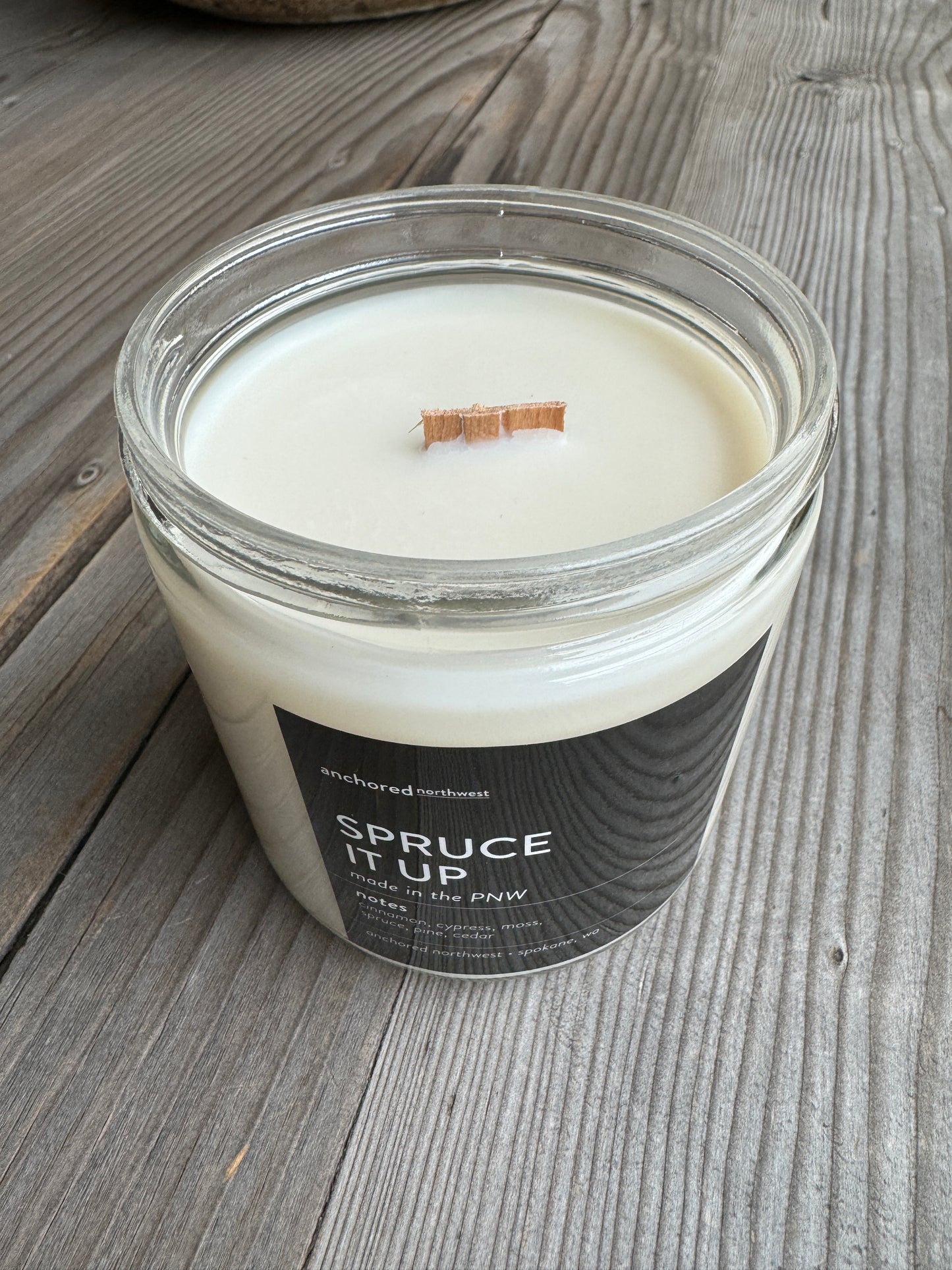 Soy wax candle with notes of cinnamon, cypress, moss, spruce, pine, and cedar.