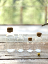 Load image into Gallery viewer, Glass Jars w/ cork lids, Glass Canisters | www.bowlandpitcher.com #glassjars #glasscanisters #cork
