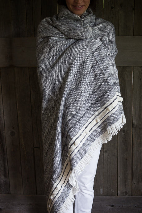 This Alpaca blanket is woven by a fair trade, family-owned weaving company in Peru. #Blanket #Alpaca