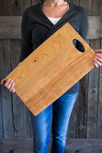 Cherry Wood serving boards with burnished edges and handle. Made in the USA. #woodboard#servingboard