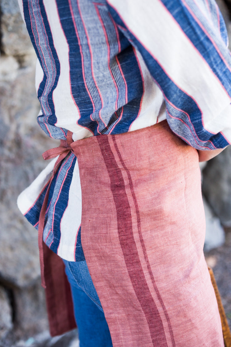 Salmon colored 100% linen towel doubles as an apron #linenapron #apron 