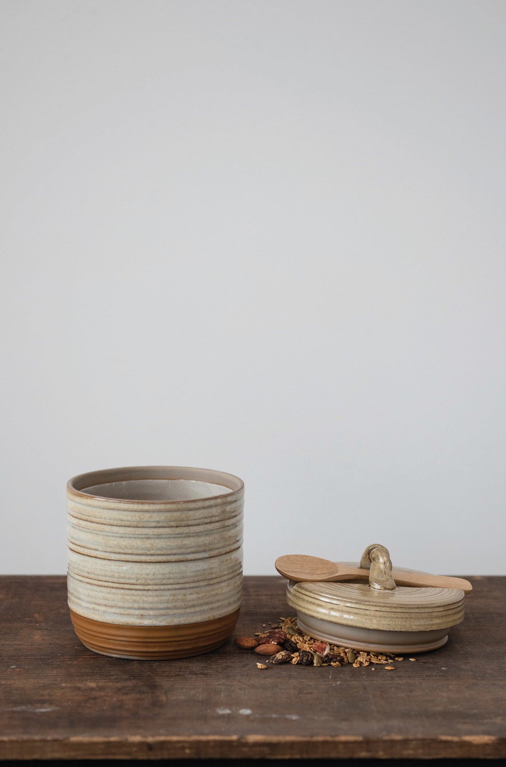 stoneware jar with lid and spoon